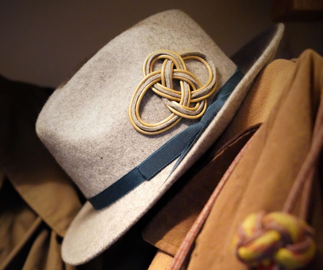 Denim hat with sherriff badge hat on coade bust